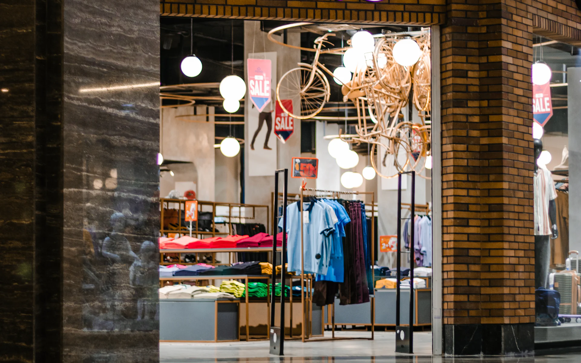Brightly lit clothing store entrance